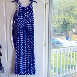 This blue and white sleeveless maxi dress is from Chicos size 2.